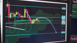 Grafik pergerakan harga aset kripto yang kompleks, mencerminkan dinamika pasar digital yang membutuhkan analisis cermat untuk pengambilan keputusan investasi. Data pada grafik ini menunjukkan volatilitas dan tren yang menjadi fokus para investor dan analis pasar.